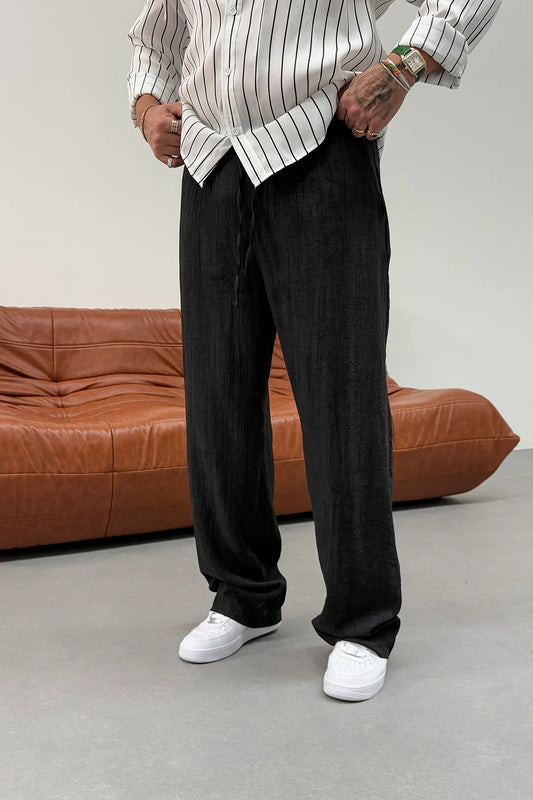 REGULAR FIT PLEATED TENS TROUSERS •  BLACK